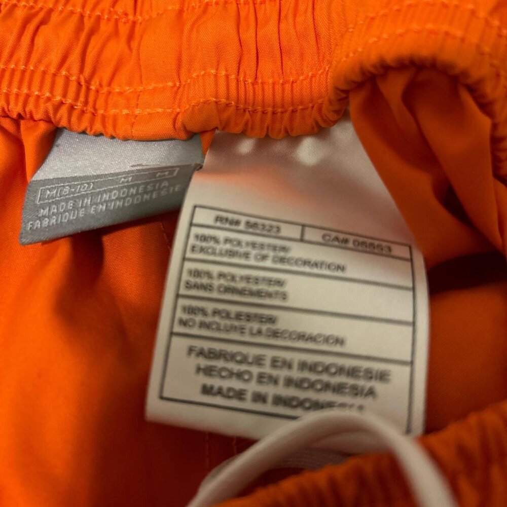 Nike orange and white shorts polyester